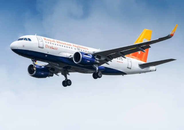 Airplane landing at Paro International Airport in Bhutan